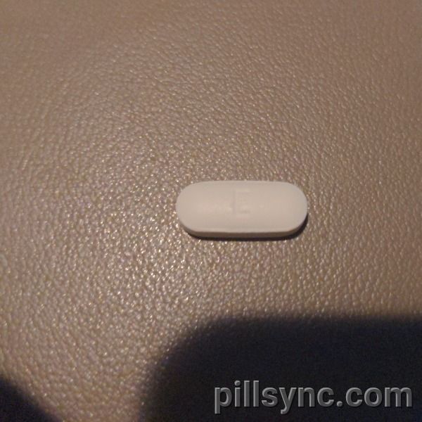 WHITE OVAL E excedrin extra strength acetaminophen aspirin caffeine